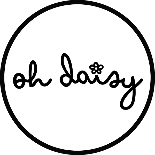 Oh Daisy logo: the name handwritten inside a circle, with a daisy over the i
