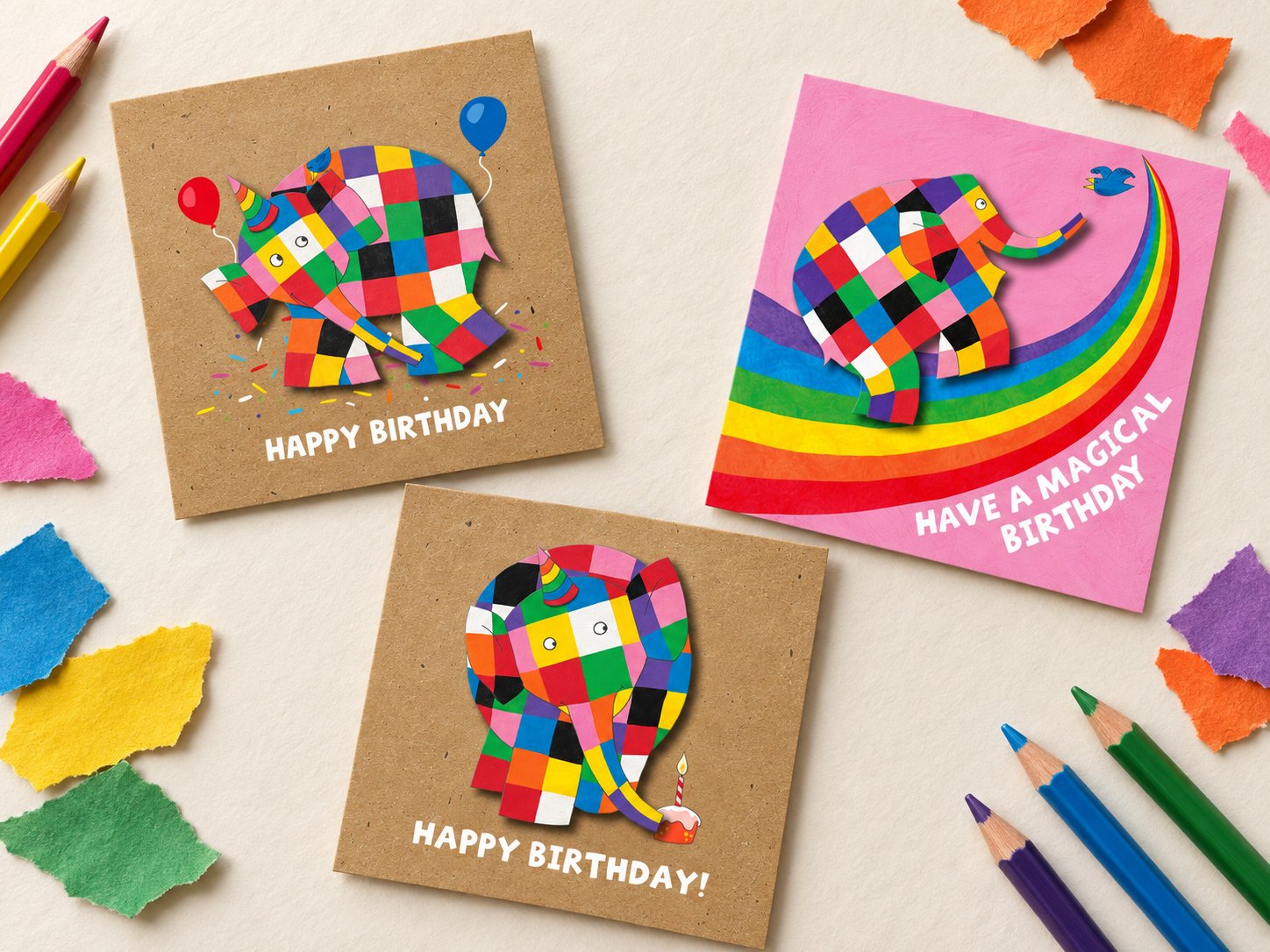 Three Tache Elmer birthday cards: two patchwork elephants on kraft, “Happy birthday”, and Elmer on a rainbow, “Have a magical birthday”